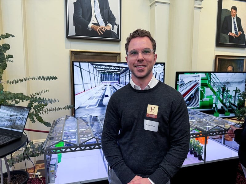 Powerplants CEO Michael Bednarz with his greenhouse technologies display at the horticulture showcase.